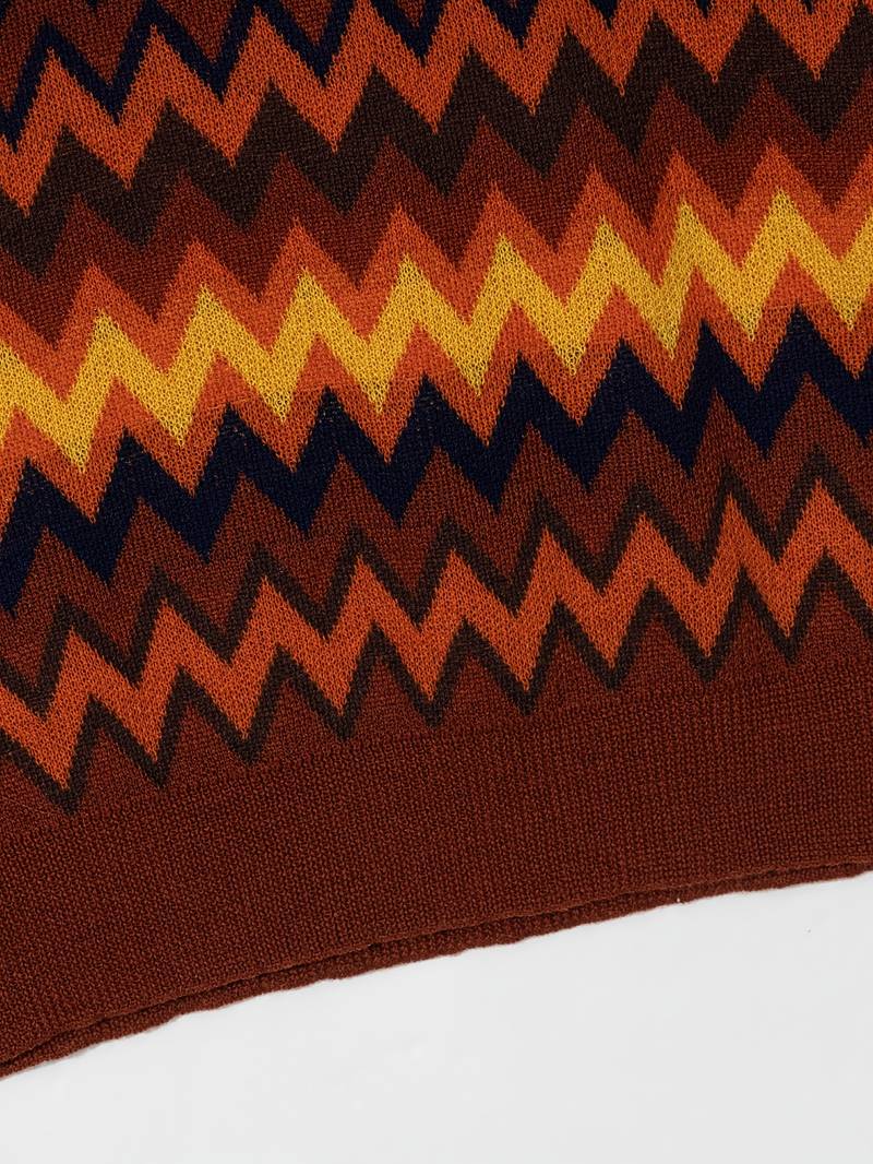 Chic gebreide polo met oud geldgolfpatroon