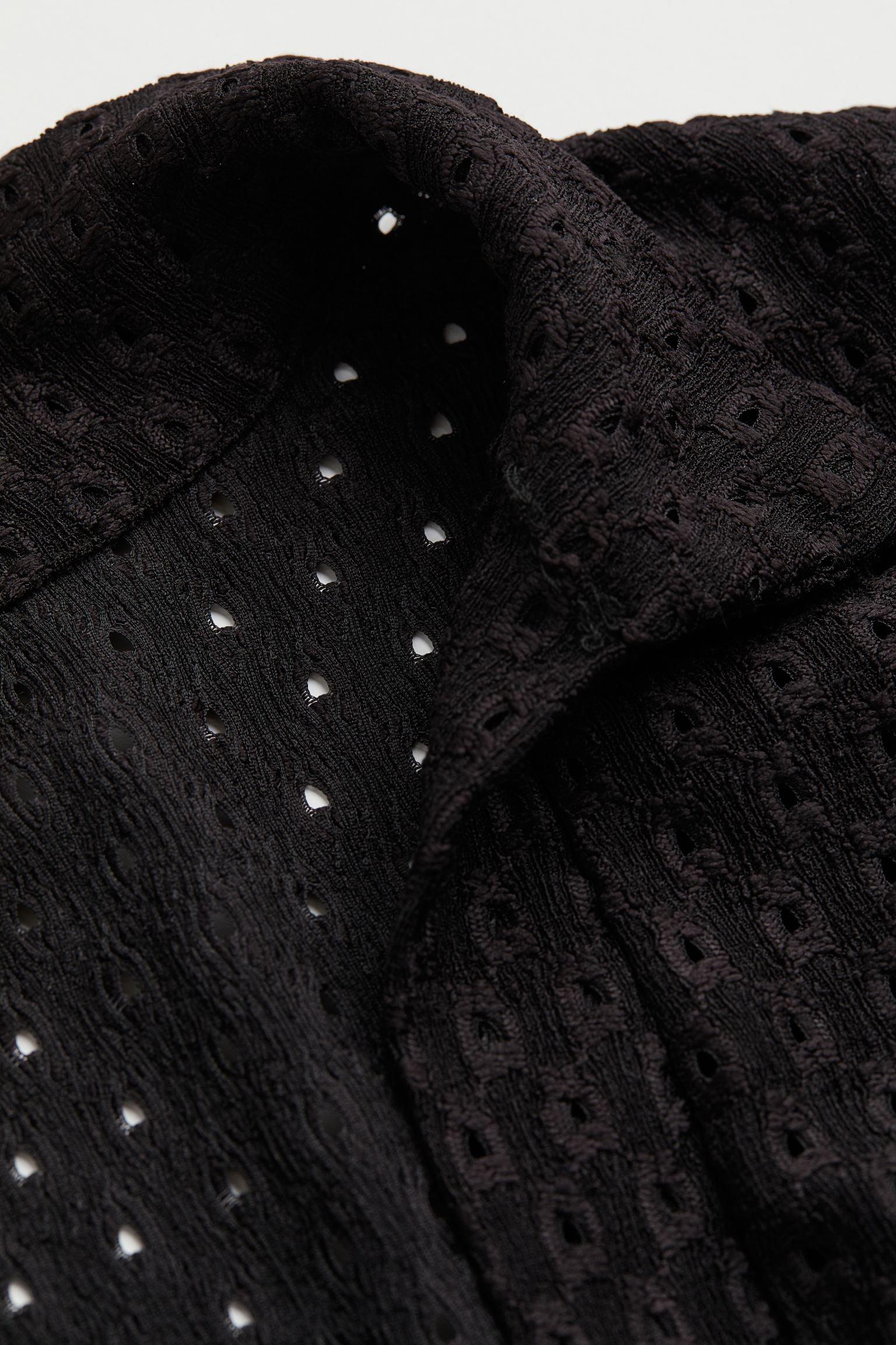 Oud geld gestippelde gebreide licht gebreide T-shirt