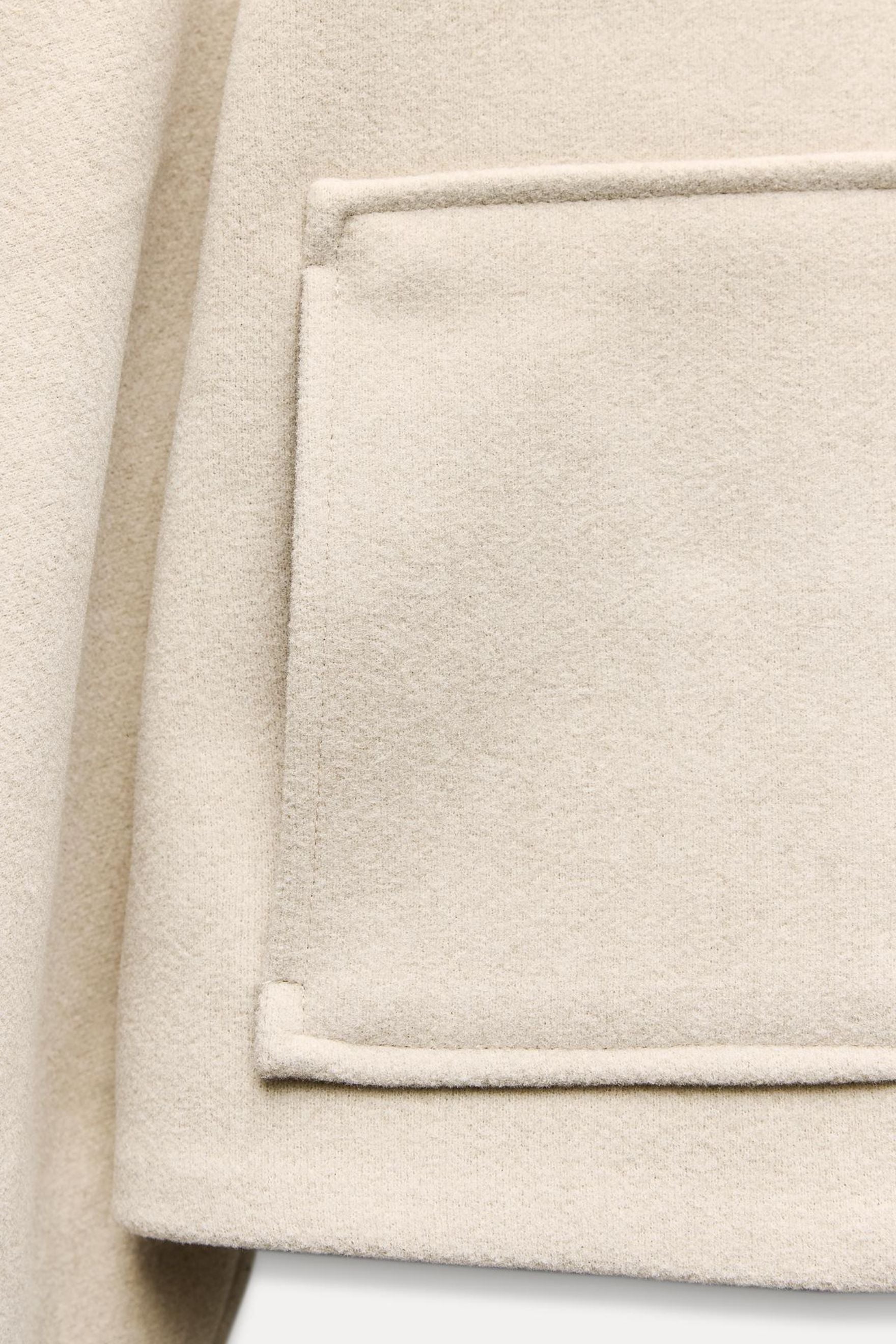 Luxe bomberjack met knoopzakken en opstaande kraag