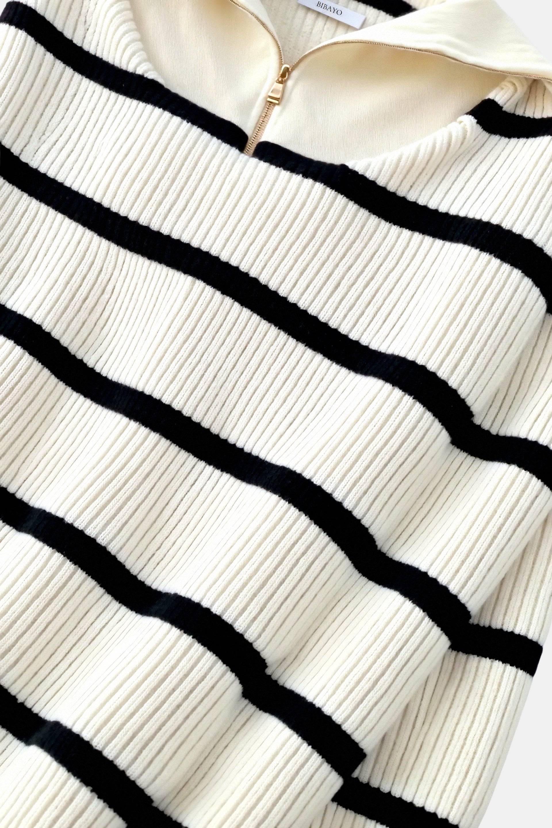 Elegante trui met kraag en dikke strepen en kwartrits