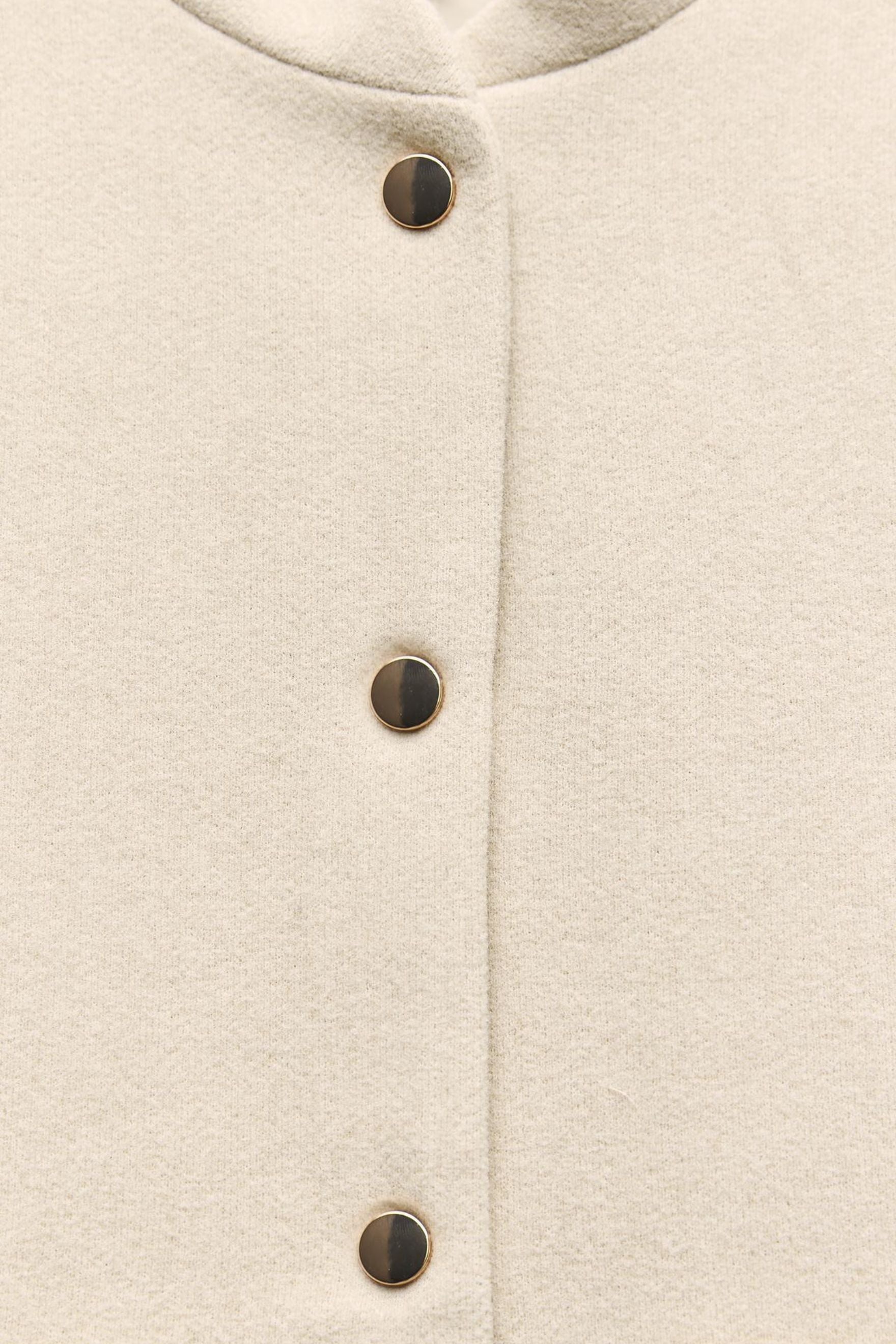 Luxe bomberjack met knoopzakken en opstaande kraag