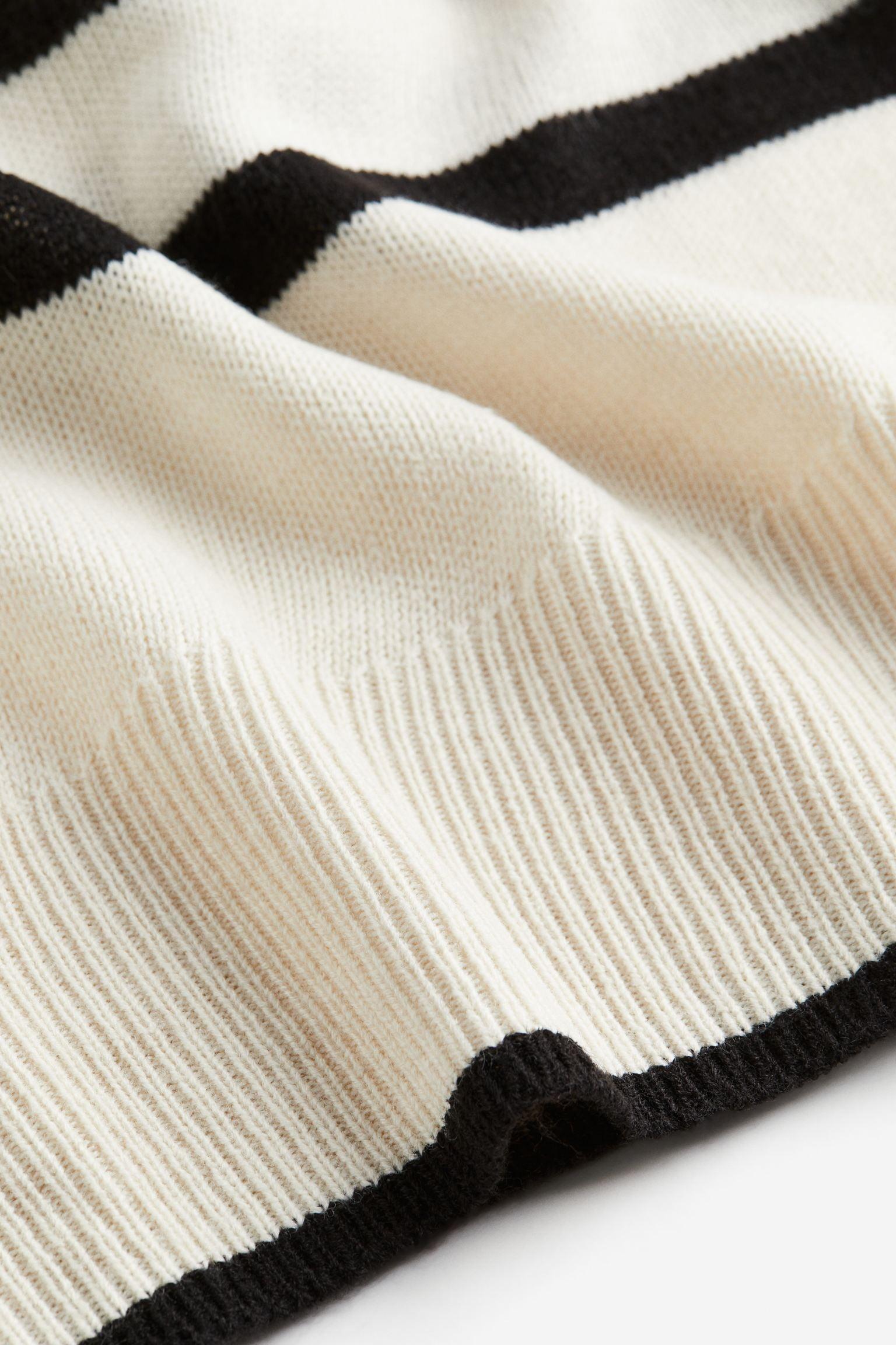 Oversized gestreepte gebreide trui van Old Money